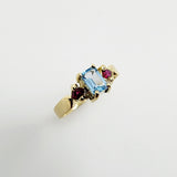 Anillo de Topacio Azul y Rubí en oro 18 k