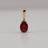 Dije de Rubí y diamante en oro 18k