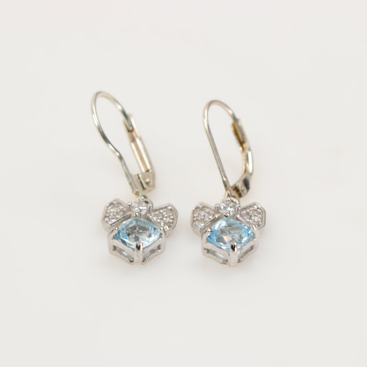 Aros de Topacio Azul Cuadrado Moño Zirconia en Plata 925 | Rocas & Cristales