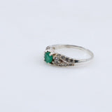 Anillo de Esmeralda y topacios blancos - Anillos