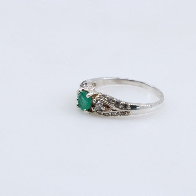 Anillo de Esmeralda y topacios blancos - Anillos