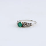 Anillo de Esmeralda y topacios blancos - Anillos