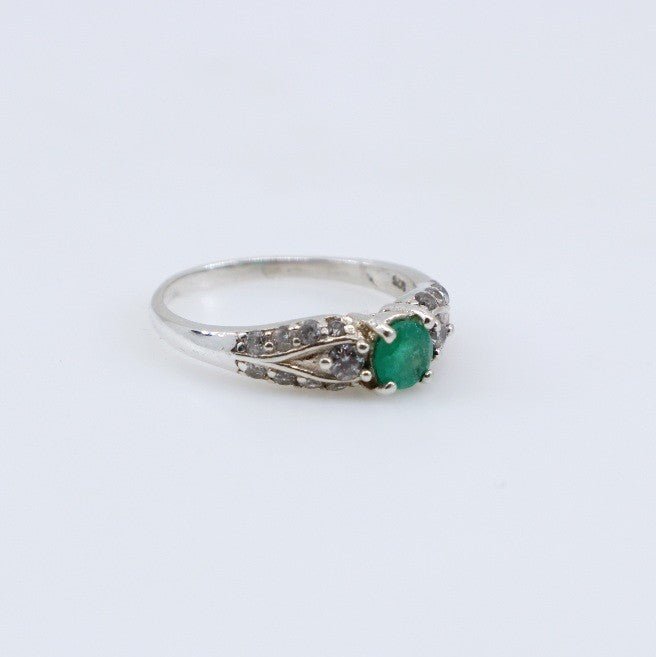 Anillo de Esmeralda y topacios blancos - Anillos