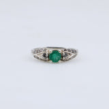 Anillo de Esmeralda y topacios blancos - Anillos