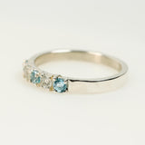 Anillo de Topacio Azul y Topacio blanco elaborado en plata 950 - Anillos