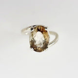 Anillo de Topacio Imperial en Plata 950 con facetado oval y diseño simple sobre fondo neutro - Anillos