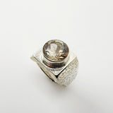 Anillo de Topacio Imperial talla 24 con banda de Plata 950 forjada y engaste en bisel.- Anillos