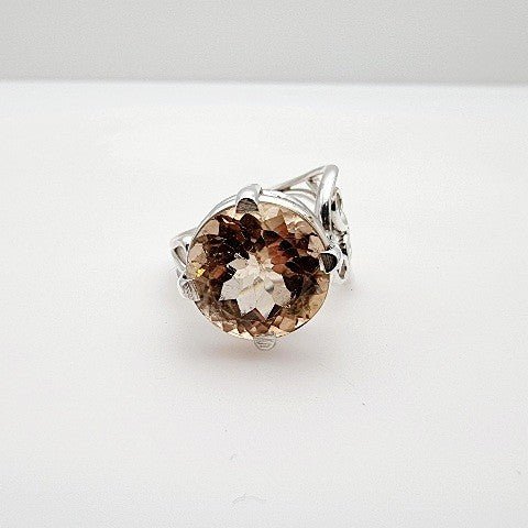 Anillo de Topacio Imperial en Plata 950 con gran piedra natural circular facetada vista frontal - Anillos