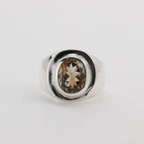 Anillo de Topacio Imperial Bi-color en Plata 950, diseño estilo sello con piedra oval.- Anillos