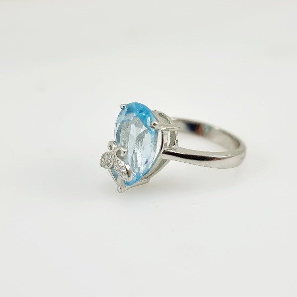 Anillo topacio azul y cubic zirconia. - Anillos