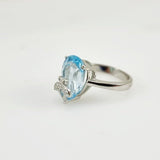 Anillo topacio azul y cubic zirconia. - Anillos