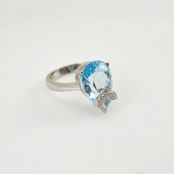 Anillo topacio azul y cubic zirconia. - Anillos