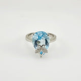 Anillo topacio azul y cubic zirconia. - Anillos