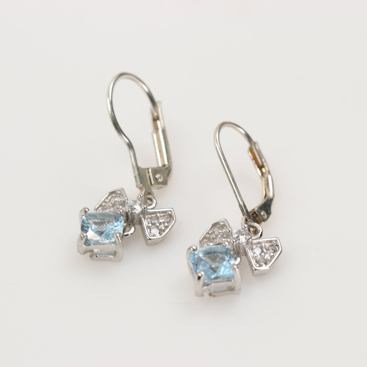 Aros de Topacio Azul Cuadrado Moño Zirconia en Plata 925 | Rocas & Cristales - Joyería de autor
