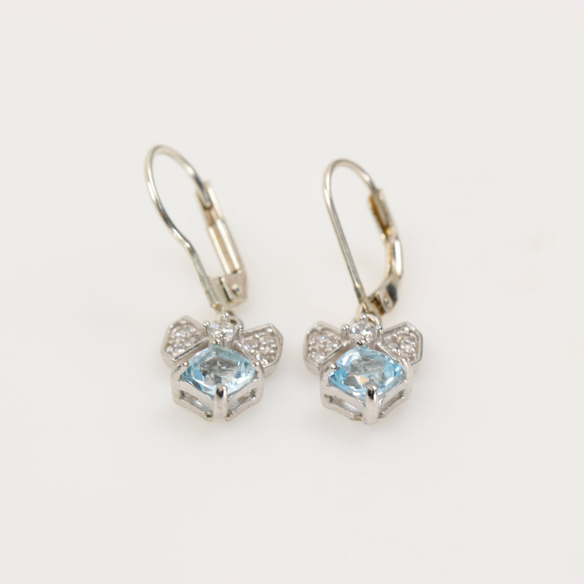 Aros de Topacio Azul Cuadrado Moño Zirconia en Plata 925 | Rocas & Cristales - Joyería de autor