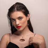 Aros de Topacio Imperial con cadena rolo en Plata 950, diseño colgante con piedra oval luciendo en mujer - Aros
