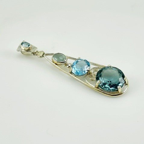 Dije Aguamarina, Topacio Azul, Cuarzo Aqua Aura y zircón natural - Dijes