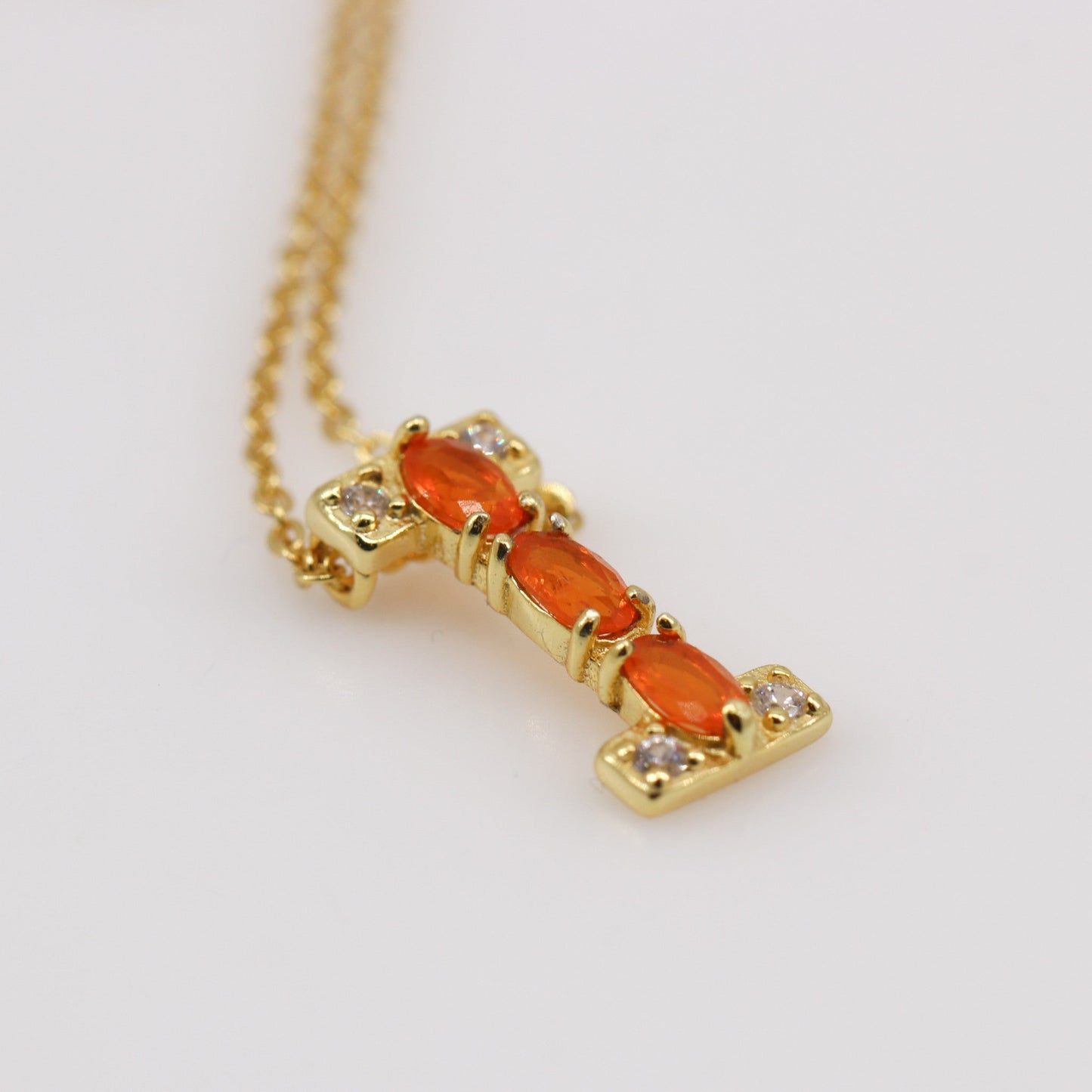 Dije de Ópalo De Fuego y cubic zirconia con cadena 45 cm y baño de oro - Dijes