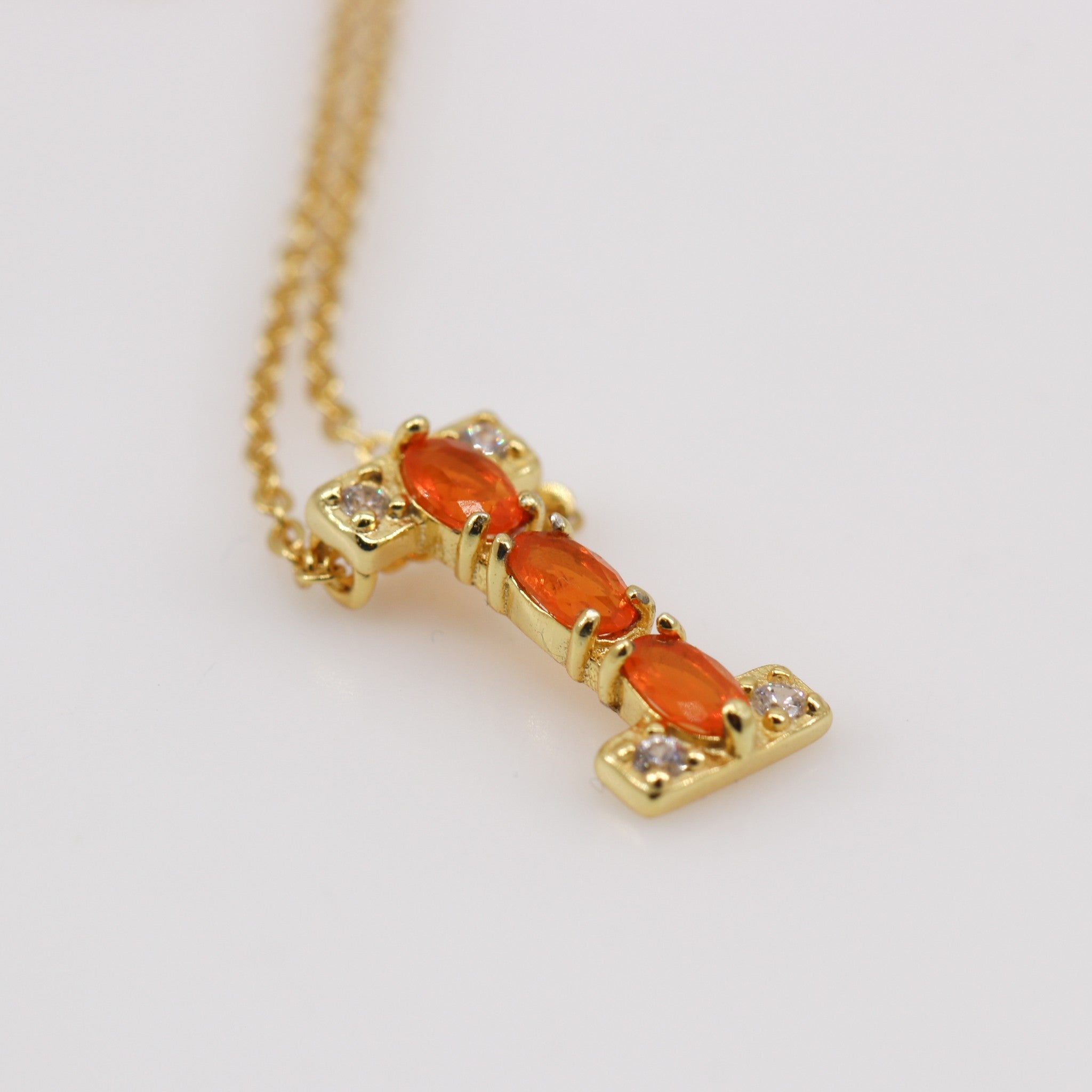 Dije de Ópalo De Fuego y cubic zirconia con cadena 45 cm y baño de oro - Dijes