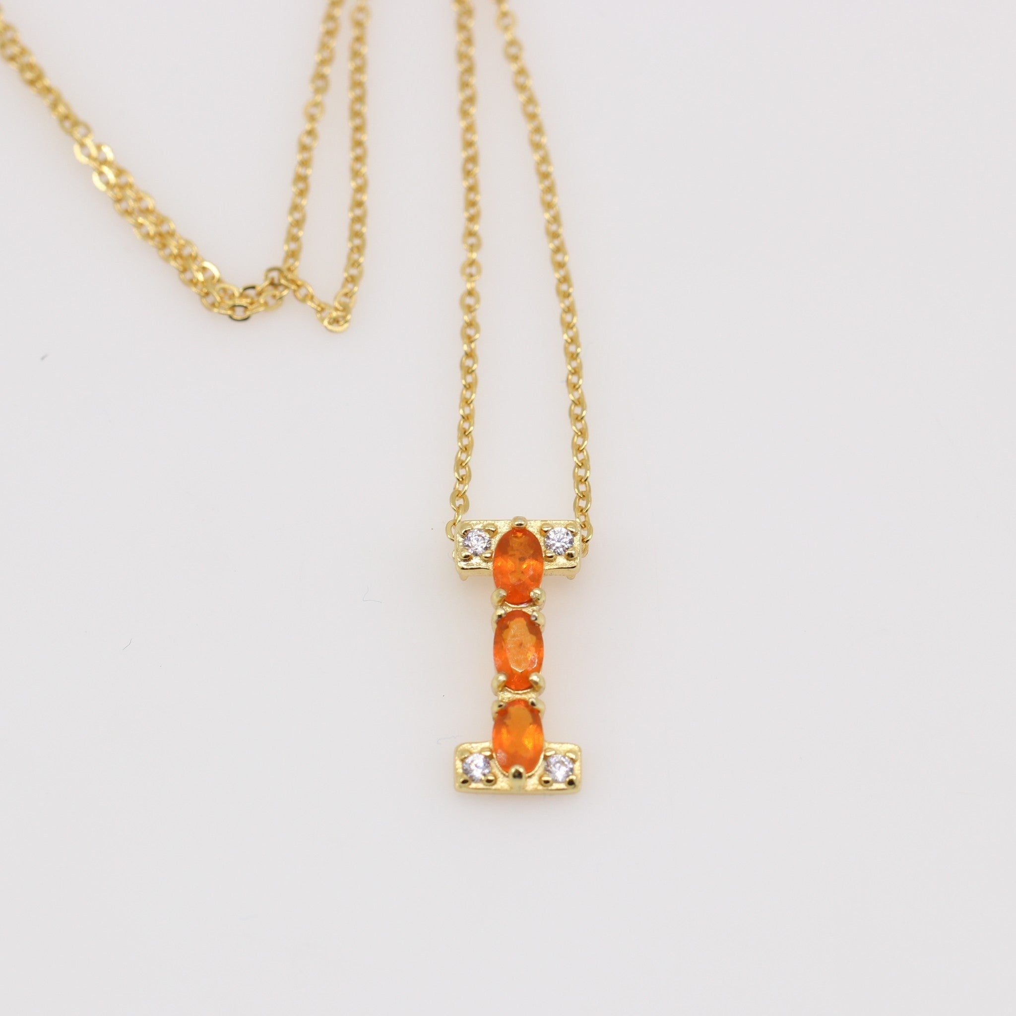 Dije de Ópalo De Fuego y cubic zirconia con cadena 45 cm y baño de oro - Dijes
