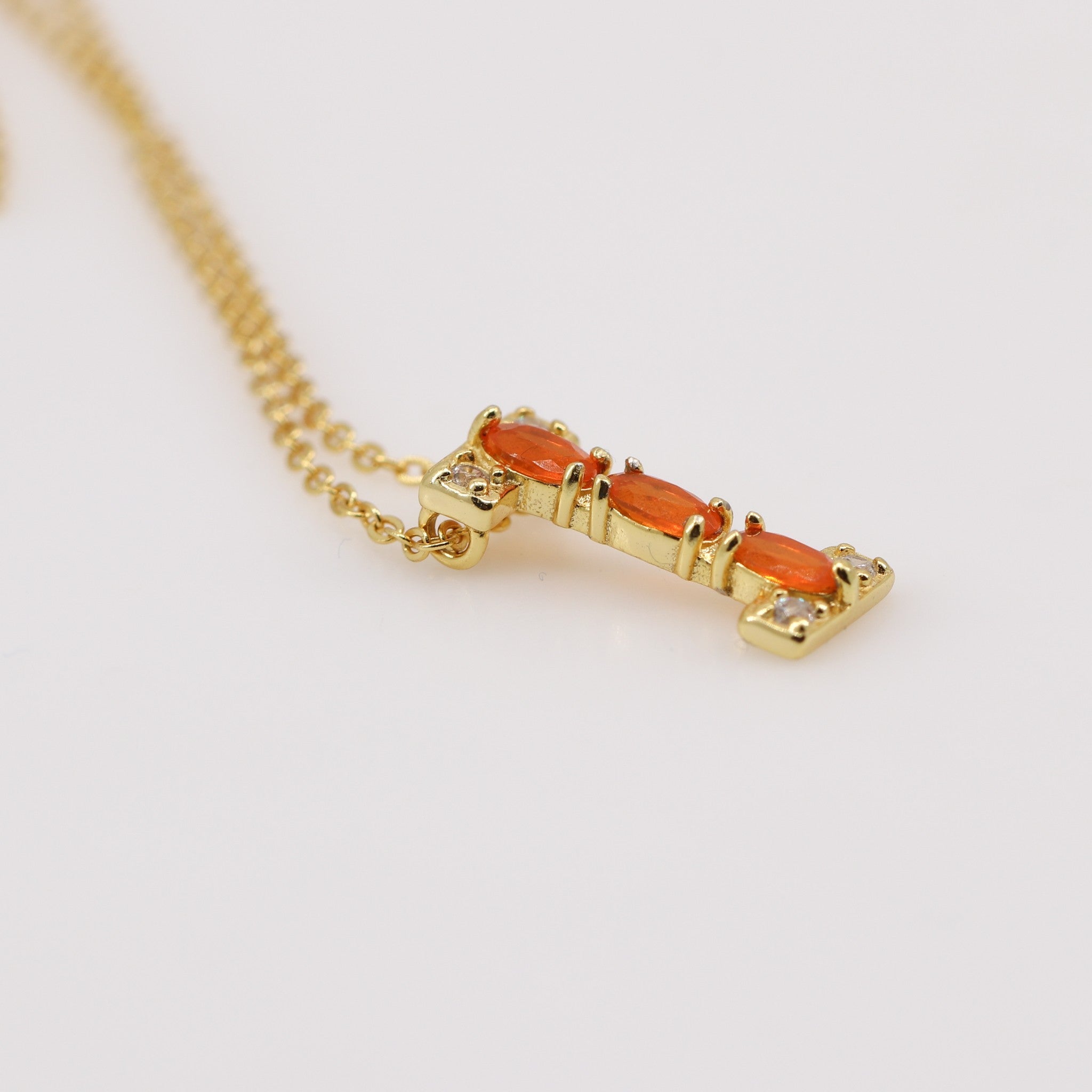 Dije de Ópalo De Fuego y cubic zirconia con cadena 45 cm y baño de oro - Dijes