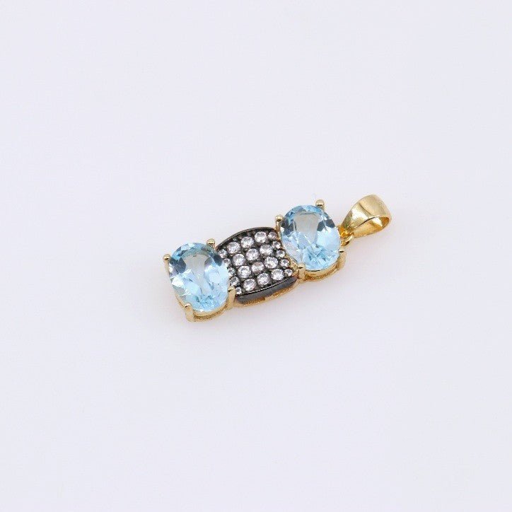 Dije de Topacio Azul y cubic zirconia con baño oro 24 k - Dijes
