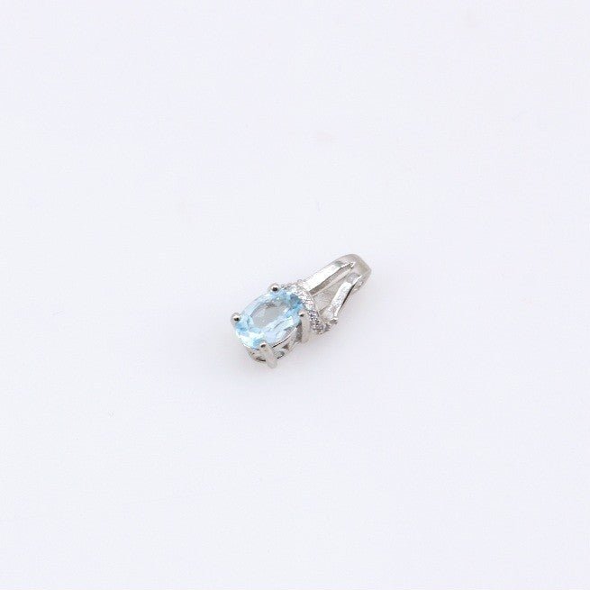 Dije de Topacio Azul y cubic zirconia - Dijes