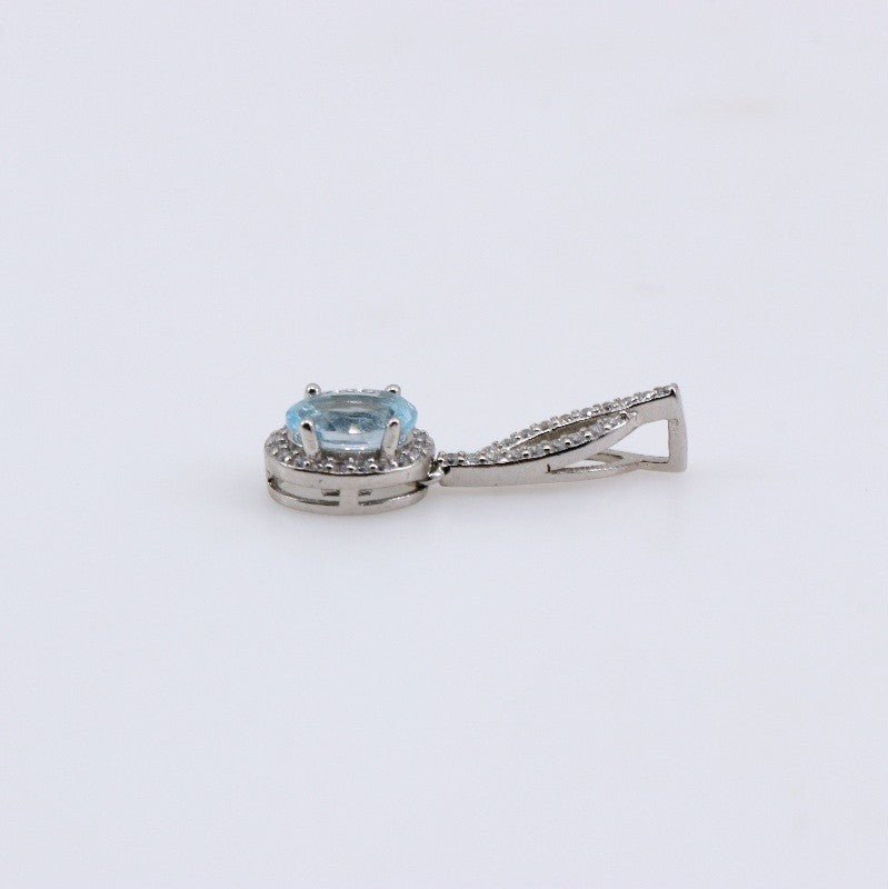 Dije de Topacio Azul y cubic zirconia - Dijes