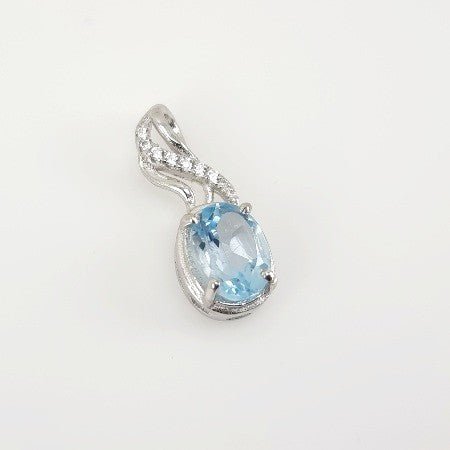 Dije de Topacio Azul y cubic zirconia - Dijes