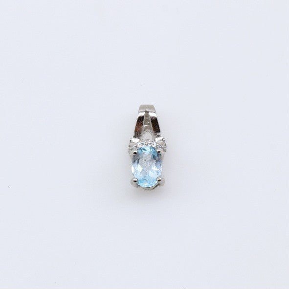 Dije de Topacio Azul y cubic zirconia - Dijes
