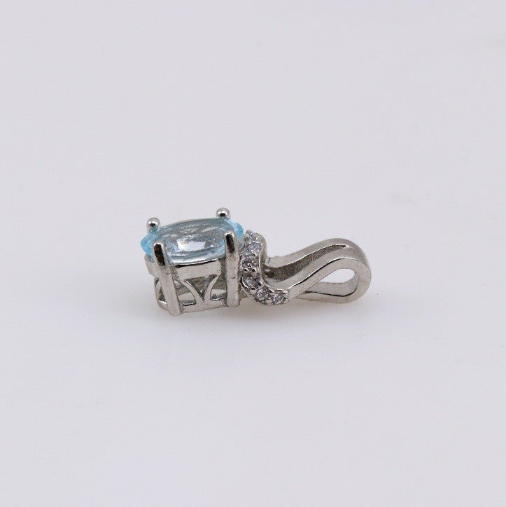 Dije de Topacio Azul y cubic zirconia - Dijes