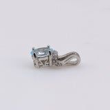Dije de Topacio Azul y cubic zirconia - Dijes