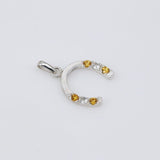 Dije de zafiro amarillo y topacio blanco en plata 950 - Dijes