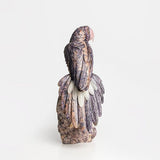 Loros violetas - Talla en piedra