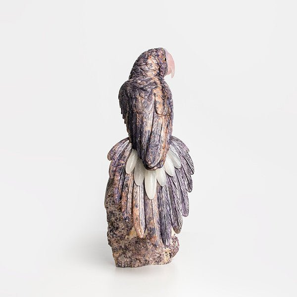 Loros violetas - Talla en piedra