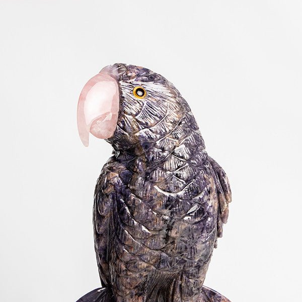 Loros violetas - Talla en piedra