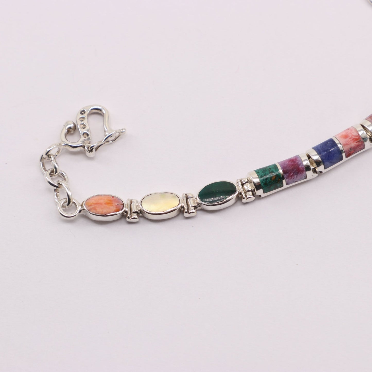 Pulsera de Malaquita y Lapislázuli en Plata 925 con cabujones pulidos de Nácar, Rodonita y Turquesa.