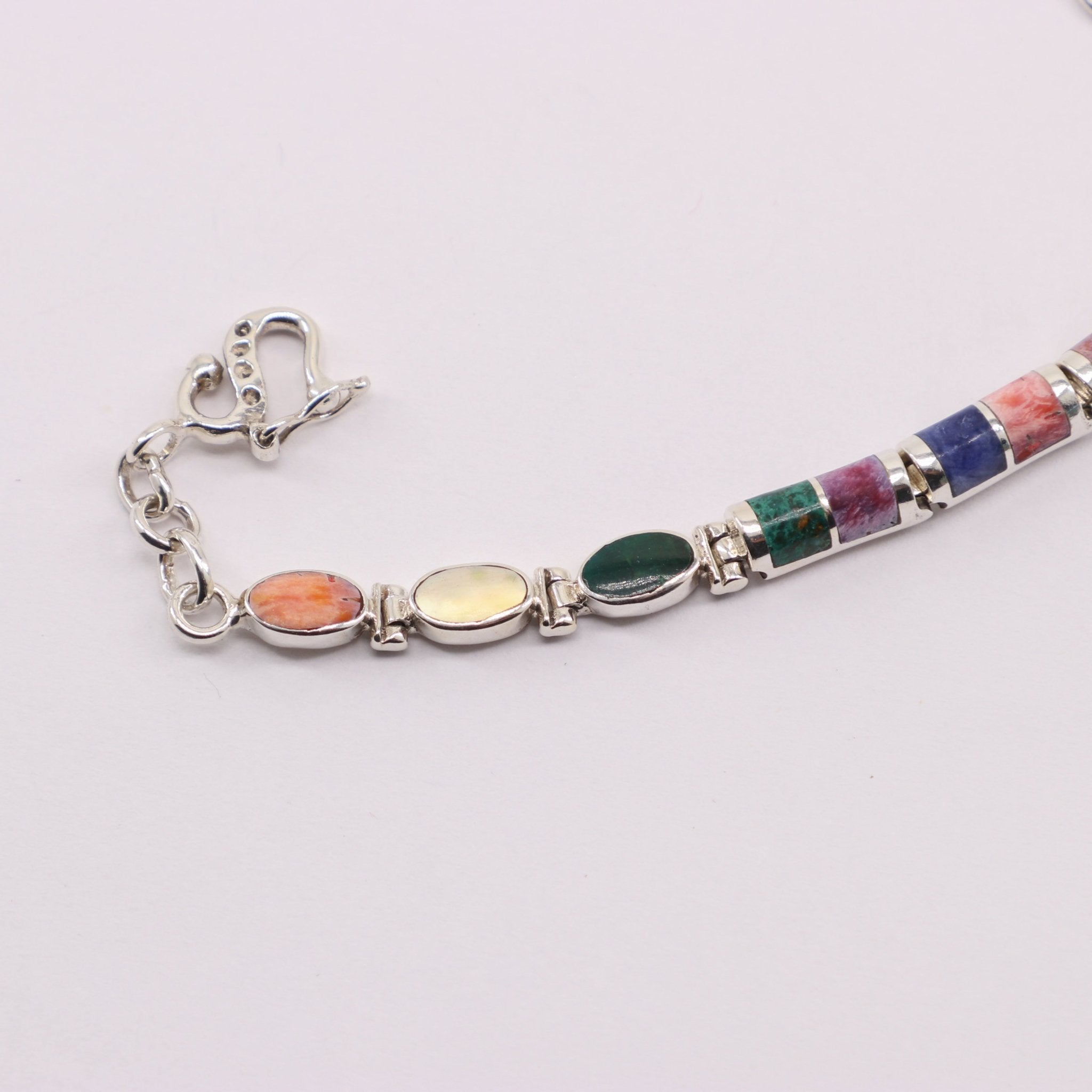 Pulsera de Malaquita y Lapislázuli en Plata 925 con cabujones pulidos de Nácar, Rodonita y Turquesa.