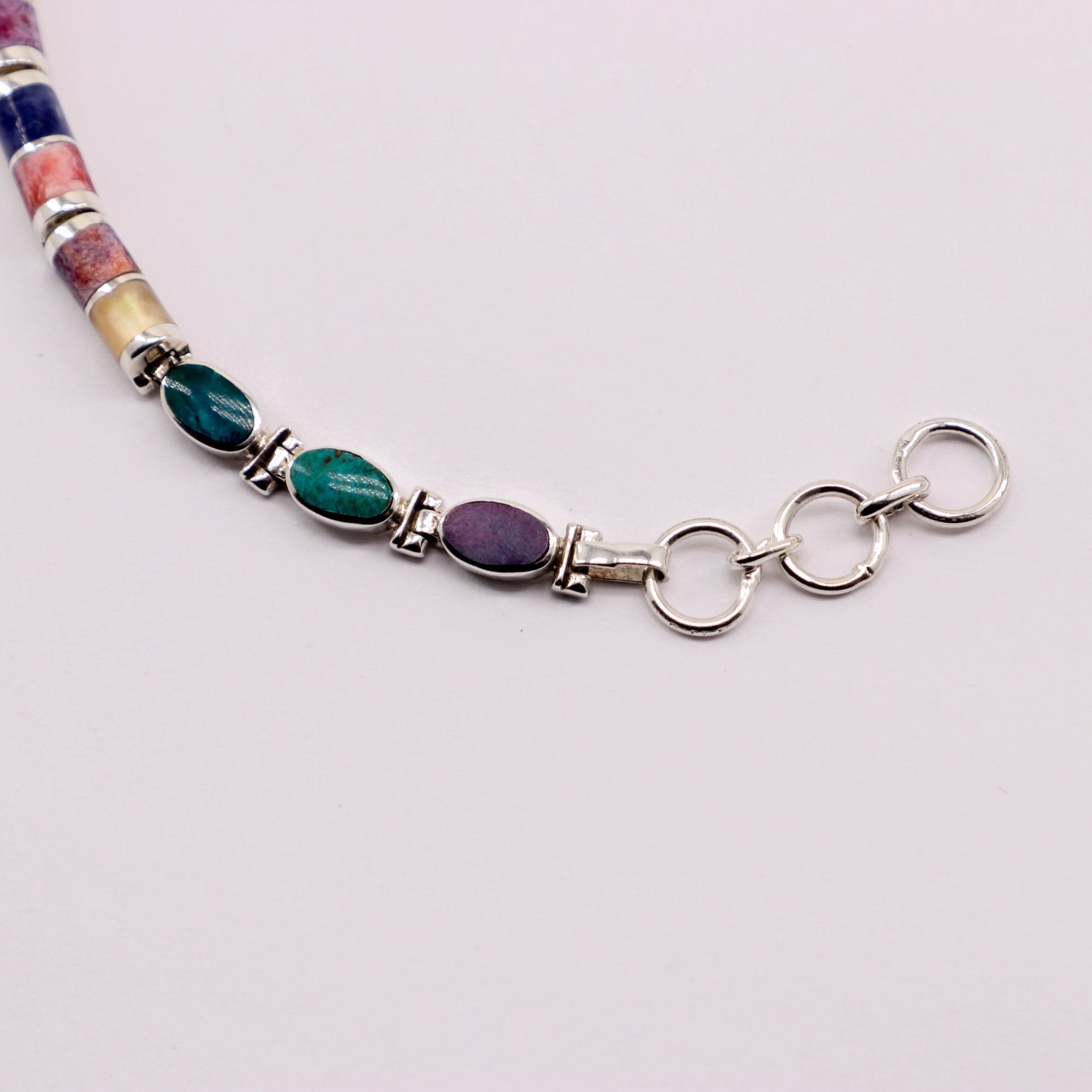 Pulsera de Malaquita y Lapislázuli en Plata 925 con cabujones pulidos de Nácar, Rodonita y Turquesa.