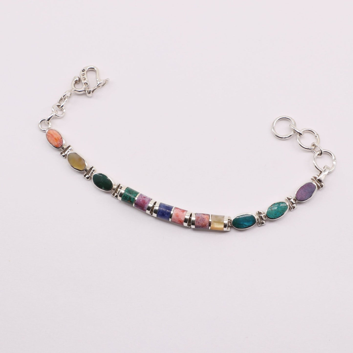 Pulsera de Malaquita y Lapislázuli en Plata 925 con cabujones pulidos de Nácar, Rodonita y Turquesa.