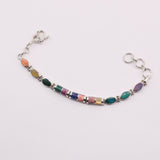 Pulsera de Malaquita y Lapislázuli en Plata 925 con cabujones pulidos de Nácar, Rodonita y Turquesa.