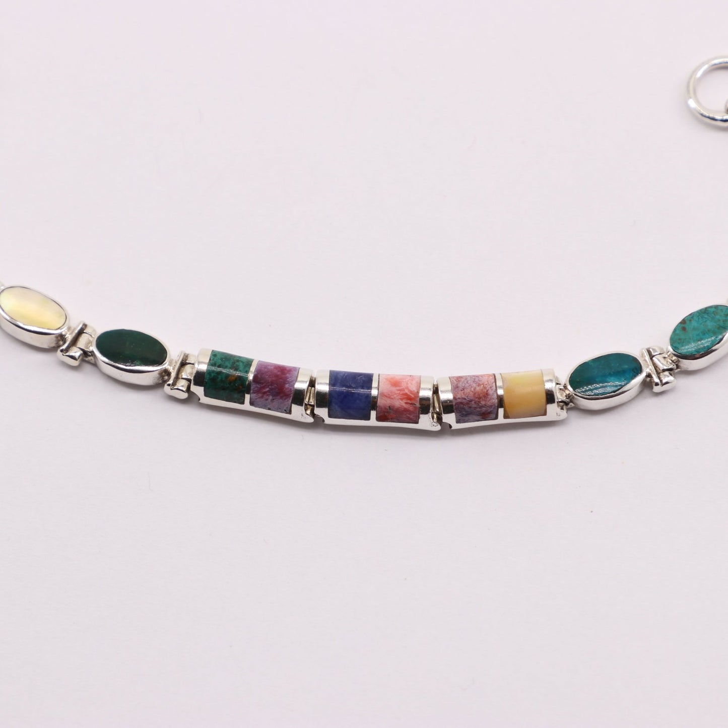 Pulsera de Malaquita y Lapislázuli en Plata 925 con cabujones pulidos de Nácar, Rodonita y Turquesa.