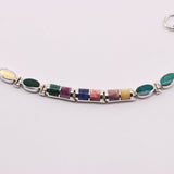 Pulsera de Malaquita y Lapislázuli en Plata 925 con cabujones pulidos de Nácar, Rodonita y Turquesa.